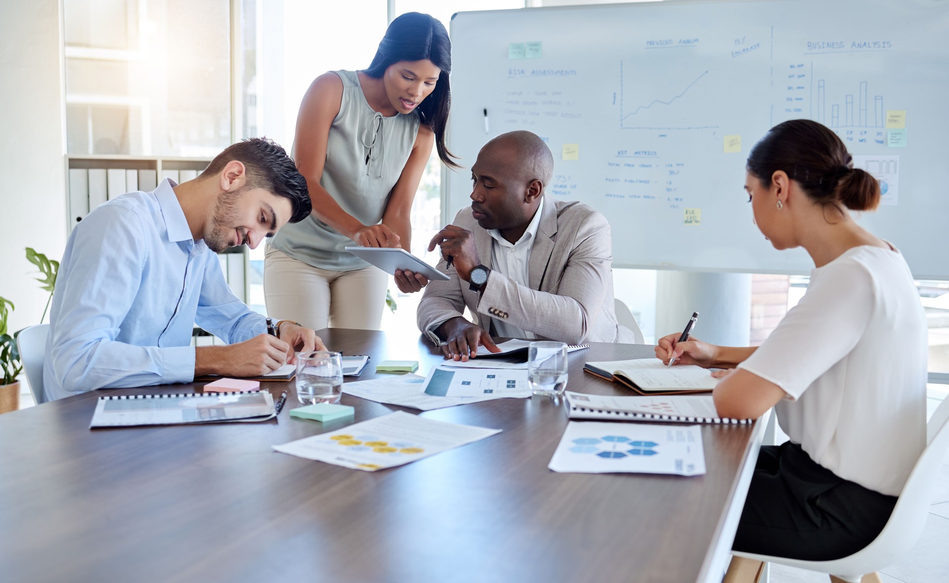 Planning, innovation and business people in a meeting for marketing sales strategy, ideas and risk assessment. Leadership, mentor and African ceo coaching, working and helping employee our vision